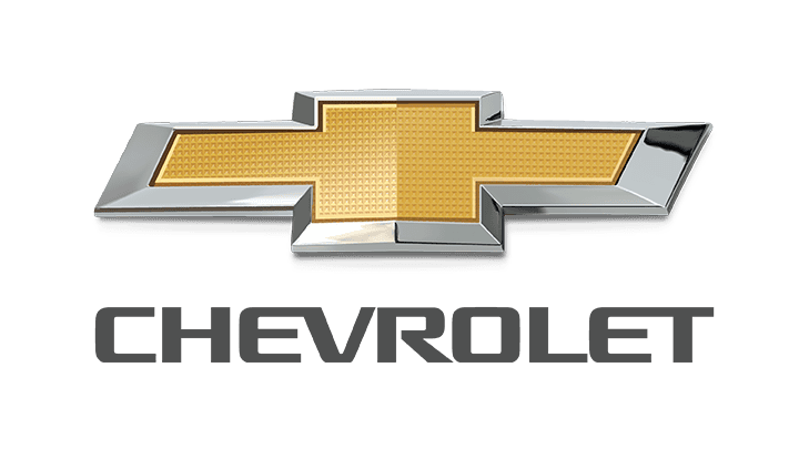 The image shows the Chevrolet logo, featuring a gold cross within a silver outline, with "CHEVROLET" written below in stylized gray capital letters, embodying its excellence in auto body craftsmanship.
